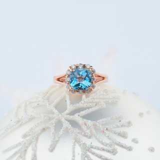Rose gold blue topaz ring
